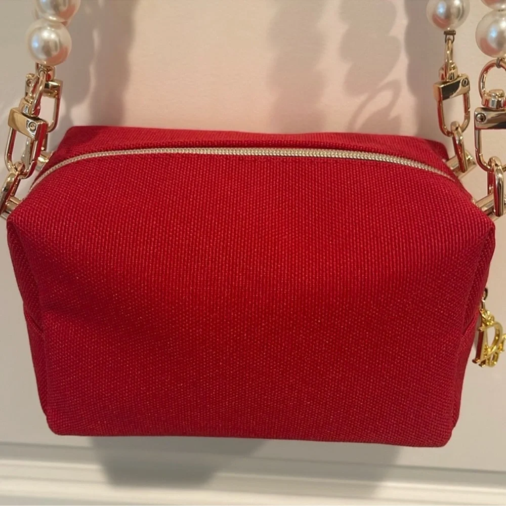 Christian Dior red canvas cosmetics bag to shoulder bag